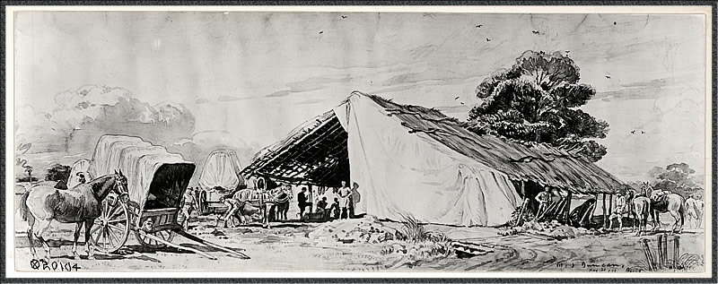 Blacksmith shop and wagon repair shed on the road to Boucq. Dark figure in the center is Louis Raemaekers, Dutch cartoonist.