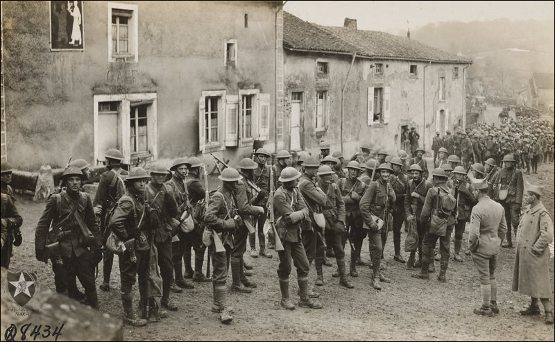 Marines resting en route to front. St. Ouen-les-Paray, France, February, 1918.