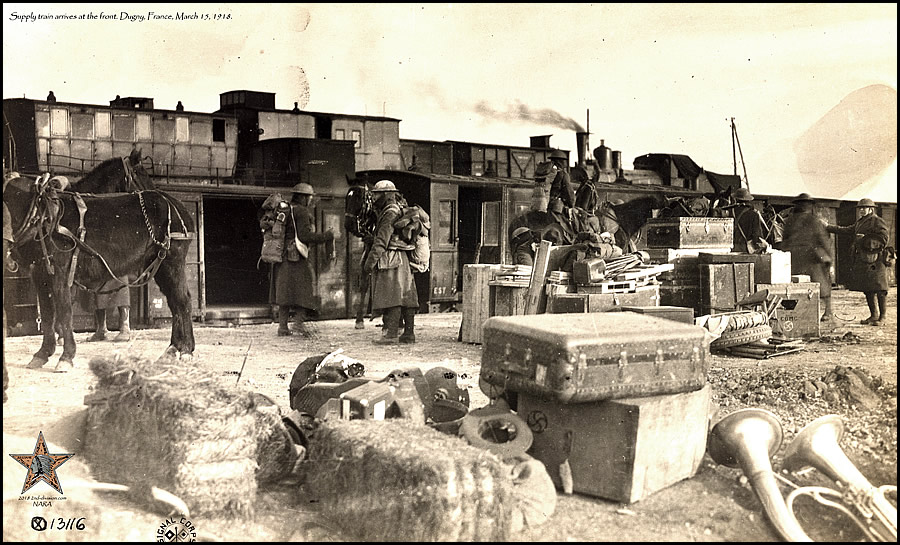 Supply train arrives at the front. Dugny, France, March 1918.