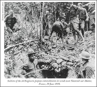 Soldiers of the 2d Engineers prepare entrenchments in woods near Nanteuil-sur-Marne, France, 
              29 June 1918